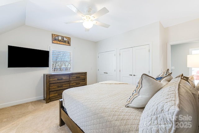 11 By The Wayside Dr, Columbus, NC 28722 - bedroom with two closets, light colored carpet, a ceiling fan, and lofted ceiling