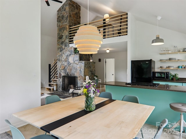 2 Briarwood Dr, Alexander, NC 28701 - dining area with high vaulted ceiling and a fireplace