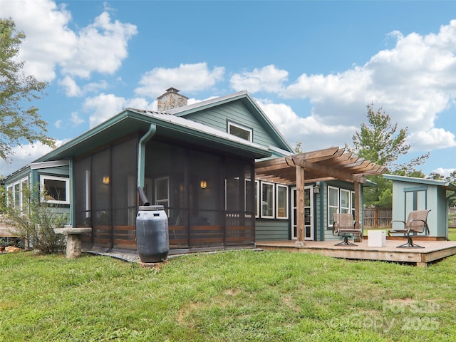 2 Briarwood Dr, Alexander, NC 28701 - rear view of house featuring a wooden deck, a pergola, a chimney, and a sunroom