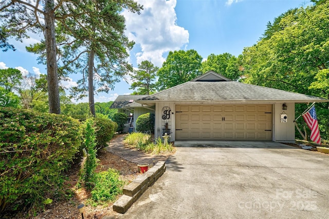17 Heritage Dr, Lake Wylie, SC 29710 - view of front of home featuring a shingled roof, driveway, and an attached garage