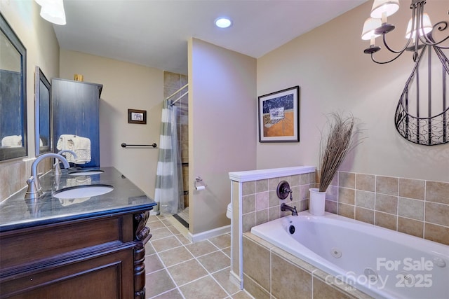 17 Heritage Dr, Lake Wylie, SC 29710 - bathroom with a jetted tub, a stall shower, double vanity, tile patterned flooring, and a chandelier