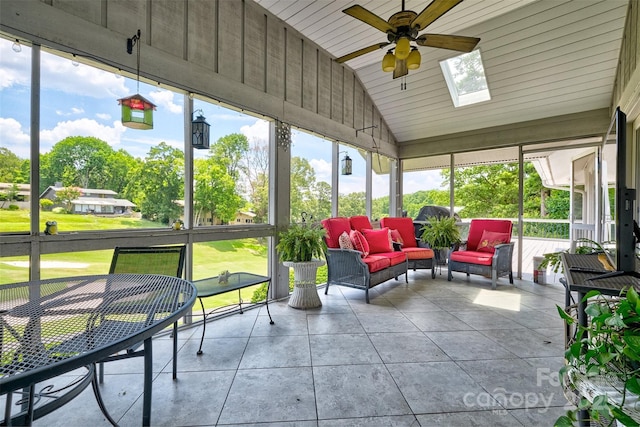 17 Heritage Dr, Lake Wylie, SC 29710 - sunroom with a ceiling fan, vaulted ceiling, outdoor lounge area, and a skylight