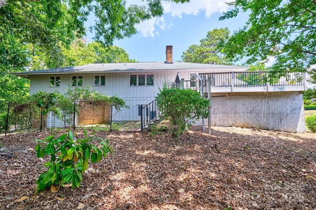 17 Heritage Dr, Lake Wylie, SC 29710 - rear view of property featuring a chimney, a wooden deck, and stairway