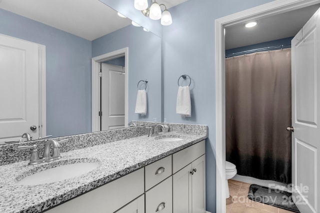 236 Robinwood Ln, Clover, SC 29710 - full bathroom with double vanity, tile patterned flooring, and a shower with curtain