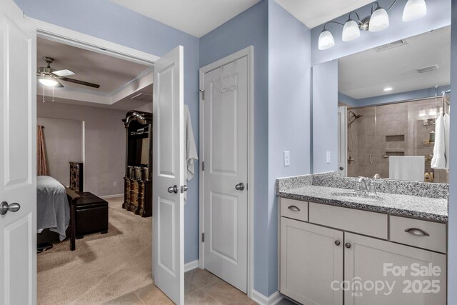 236 Robinwood Ln, Clover, SC 29710 - full bathroom with vanity, a ceiling fan, ensuite bath, and a tile shower