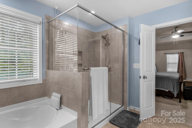 236 Robinwood Ln, Clover, SC 29710 - ensuite bathroom with a garden tub, a shower stall, a ceiling fan, and tile patterned flooring