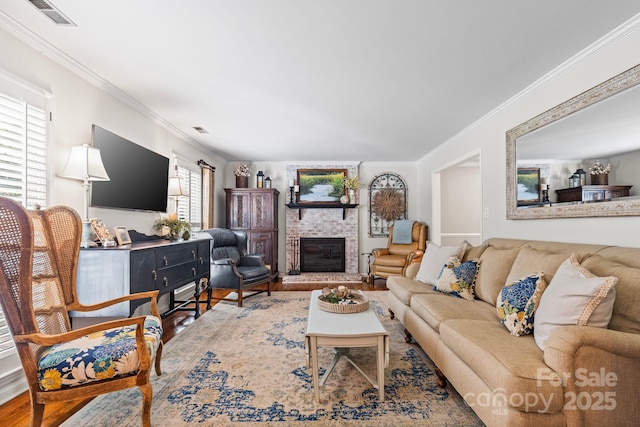 2838 Candleberry Ct, Charlotte, NC 28210 - living area featuring crown molding, wood finished floors, and a fireplace