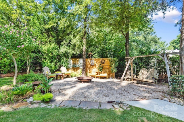2838 Candleberry Ct, Charlotte, NC 28210 - view of patio / terrace featuring a fire pit
