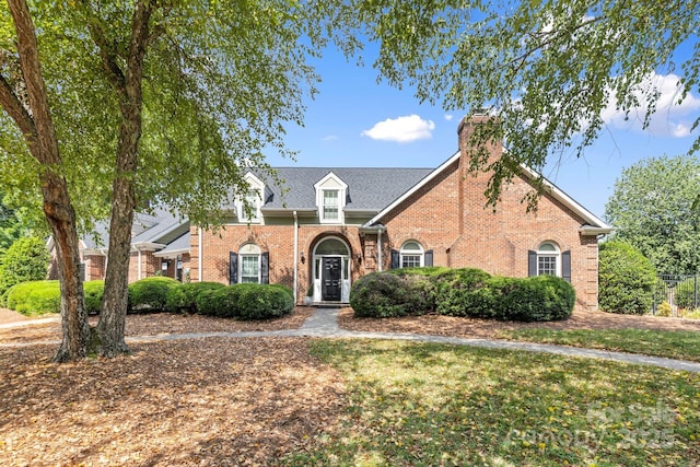 2838 Candleberry Ct, Charlotte, NC 28210 - view of front of home featuring brick siding and a chimney