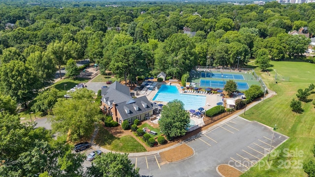 2838 Candleberry Ct, Charlotte, NC 28210 - aerial view of property and surrounding area featuring a pool area and a forest