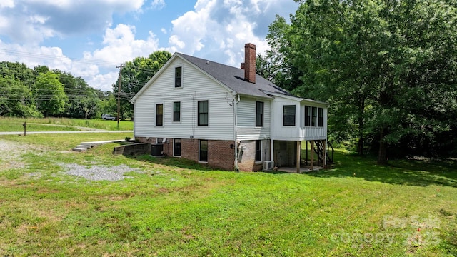 2704 Kool Park Rd NE, Hickory, NC 28601 - view of side of property featuring a chimney and a yard