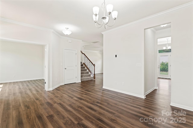 15213 Red Canoe Way, Charlotte, NC 28278 - empty room with a chandelier, stairway, crown molding, and dark wood-style floors