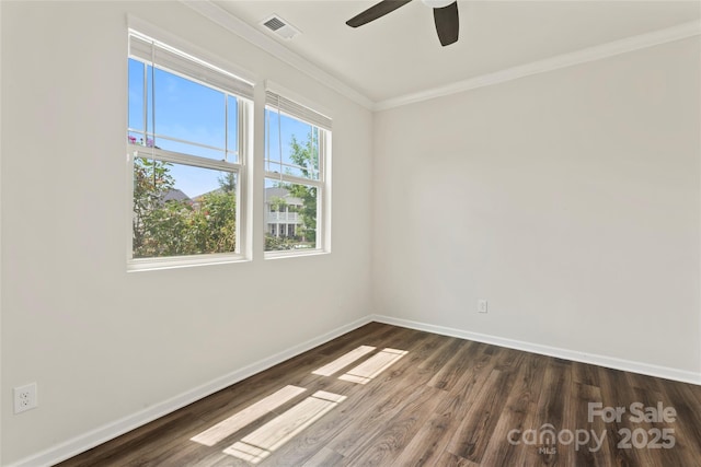 15213 Red Canoe Way, Charlotte, NC 28278 - empty room with crown molding, a ceiling fan, and dark wood-type flooring
