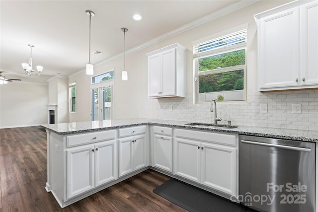 15213 Red Canoe Way, Charlotte, NC 28278 - kitchen featuring dishwasher, a peninsula, crown molding, dark wood finished floors, and white cabinets