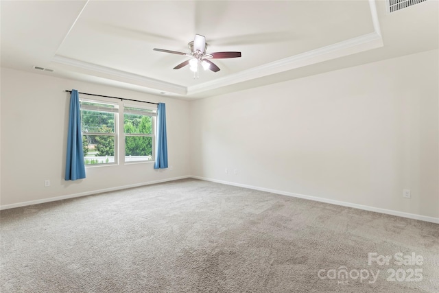 15213 Red Canoe Way, Charlotte, NC 28278 - carpeted empty room featuring a raised ceiling, ceiling fan, and crown molding