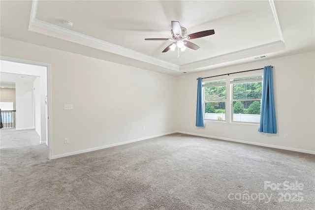 15213 Red Canoe Way, Charlotte, NC 28278 - carpeted empty room with a raised ceiling, plenty of natural light, a ceiling fan, crown molding, and a smoke detector
