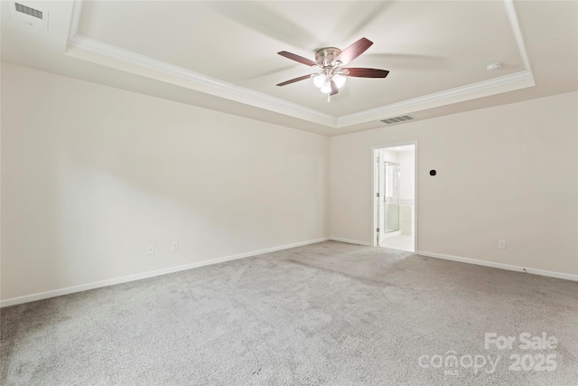 15213 Red Canoe Way, Charlotte, NC 28278 - carpeted empty room featuring a tray ceiling, ornamental molding, a ceiling fan, and a smoke detector