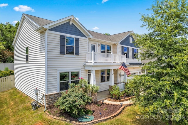 15213 Red Canoe Way, Charlotte, NC 28278 - view of front of house featuring a balcony and roof with shingles