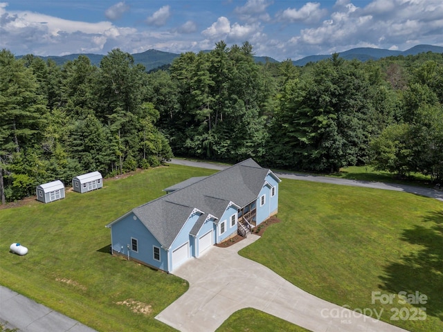 321 Benjamins Way Unit 48, Hendersonville, NC 28792 - view of subject property featuring a forest and a mountainous background