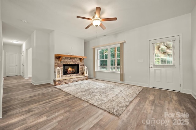 321 Benjamins Way Unit 48, Hendersonville, NC 28792 - unfurnished living room with plenty of natural light, wood finished floors, and ceiling fan