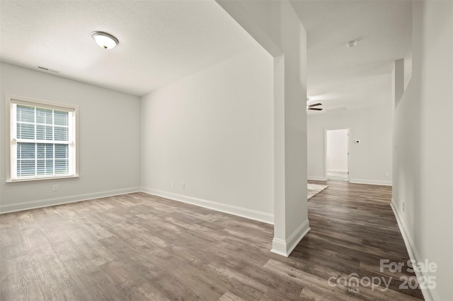 321 Benjamins Way Unit 48, Hendersonville, NC 28792 - empty room featuring dark wood-type flooring, a smoke detector, and a ceiling fan
