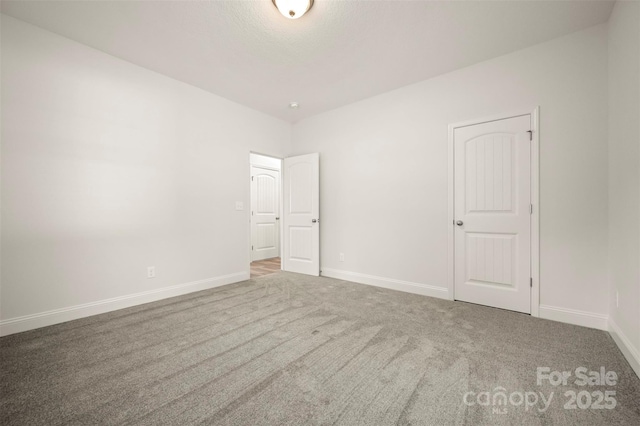 321 Benjamins Way Unit 48, Hendersonville, NC 28792 - unfurnished bedroom featuring carpet flooring and baseboards