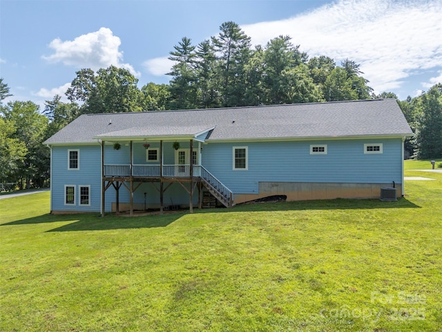 321 Benjamins Way Unit 48, Hendersonville, NC 28792 - rear view of property with stairs, a lawn, a wooden deck, and a shingled roof