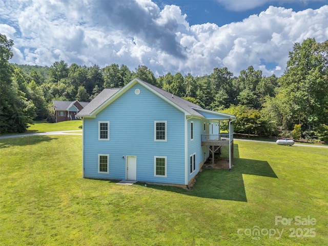 321 Benjamins Way Unit 48, Hendersonville, NC 28792 - view of home's exterior with a lawn and a view of trees