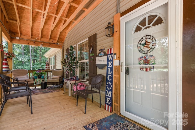 824 Brevard Place Rd, Iron Station, NC 28080 - entrance to property featuring covered porch and outdoor lounge area