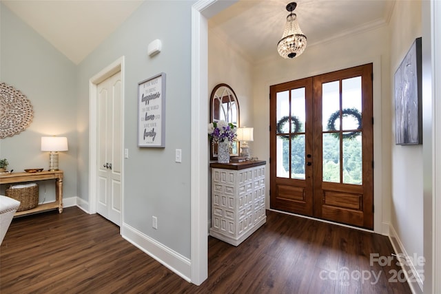416 Yorkfield Dr, Shelby, NC 28150 - entrance foyer featuring french doors, dark wood finished floors, lofted ceiling, ornamental molding, and a chandelier