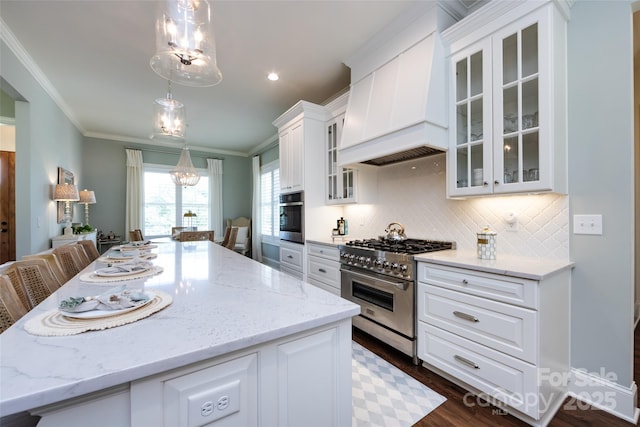 416 Yorkfield Dr, Shelby, NC 28150 - kitchen featuring stainless steel appliances, custom exhaust hood, a chandelier, white cabinets, and crown molding