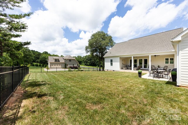 416 Yorkfield Dr, Shelby, NC 28150 - fenced backyard featuring ceiling fan and a patio