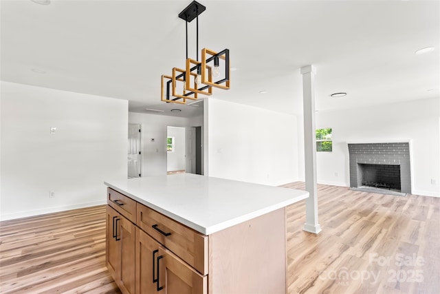 1050 Barnett Dr, Kings Mountain, NC 28086 - kitchen featuring open floor plan, light wood-type flooring, plenty of natural light, and a center island