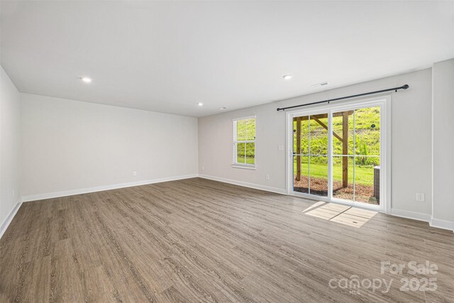 2040 Dornoch Rd, Tega Cay, SC 29708 - unfurnished room featuring wood finished floors and recessed lighting