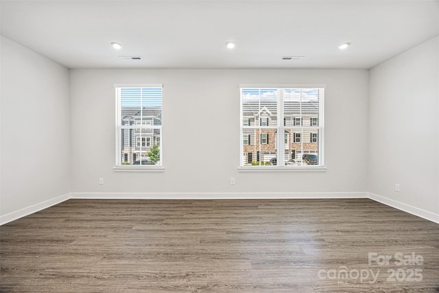 2040 Dornoch Rd, Tega Cay, SC 29708 - empty room with wood finished floors and recessed lighting