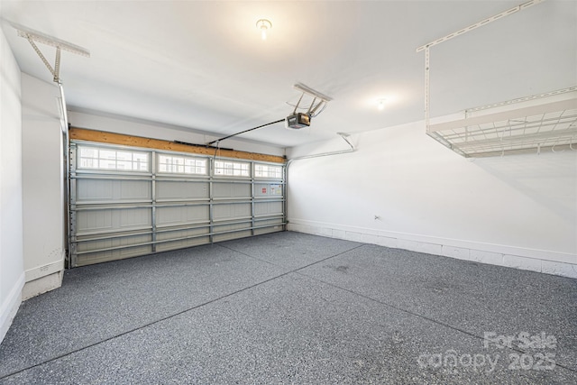 2040 Dornoch Rd, Tega Cay, SC 29708 - garage featuring a garage door opener and baseboards