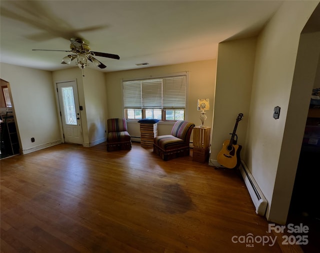 169 Montview Cir, Brevard, NC 28712 - living area featuring a baseboard radiator, a ceiling fan, and wood finished floors