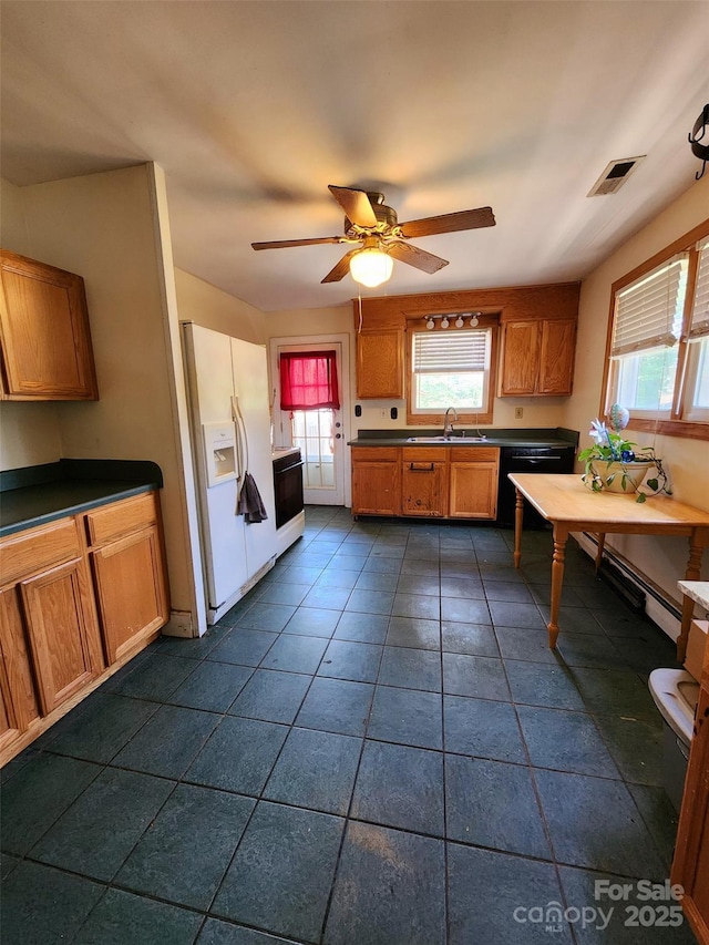 169 Montview Cir, Brevard, NC 28712 - kitchen featuring white fridge with ice dispenser, black dishwasher, dark countertops, dark tile patterned flooring, and ceiling fan