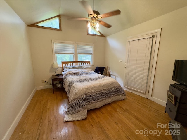 169 Montview Cir, Brevard, NC 28712 - bedroom with wood finished floors, vaulted ceiling, and a ceiling fan