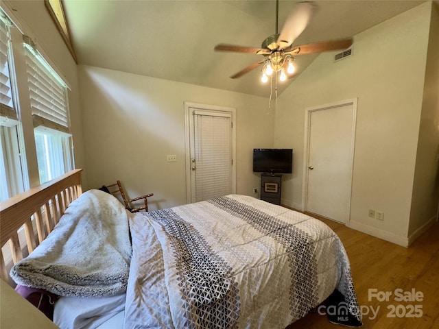 169 Montview Cir, Brevard, NC 28712 - bedroom featuring vaulted ceiling, light wood-style flooring, and a ceiling fan