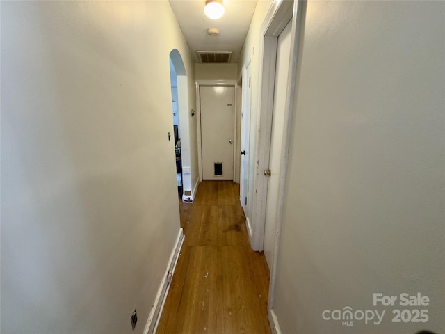 169 Montview Cir, Brevard, NC 28712 - hall with wood finished floors and arched walkways