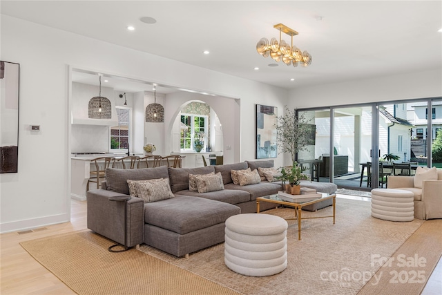 1401 Heather Ln, Charlotte, NC 28209 - living room with wood finished floors and recessed lighting