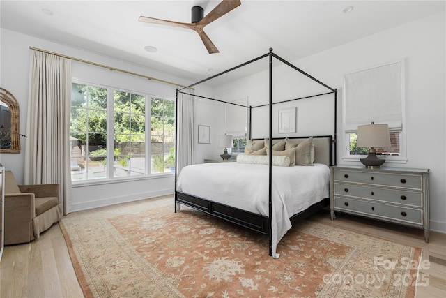1401 Heather Ln, Charlotte, NC 28209 - bedroom with wood finished floors and a ceiling fan