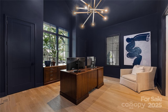 1401 Heather Ln, Charlotte, NC 28209 - office area featuring light wood-style floors and a towering ceiling