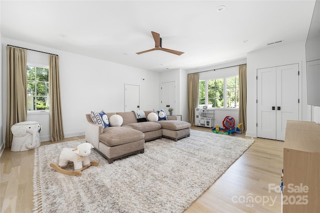 1401 Heather Ln, Charlotte, NC 28209 - living area with light wood finished floors and ceiling fan
