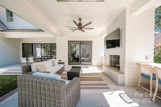 1401 Heather Ln, Charlotte, NC 28209 - view of patio / terrace featuring an outdoor living space with a fireplace and ceiling fan