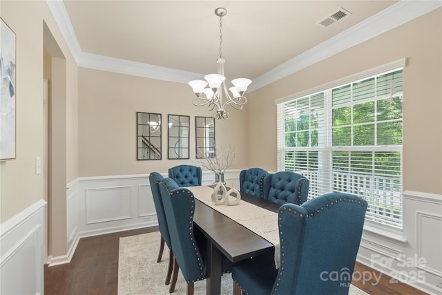 10806 Cove Point Dr, Charlotte, NC 28278 - dining room with crown molding, dark wood-style flooring, a chandelier, and wainscoting