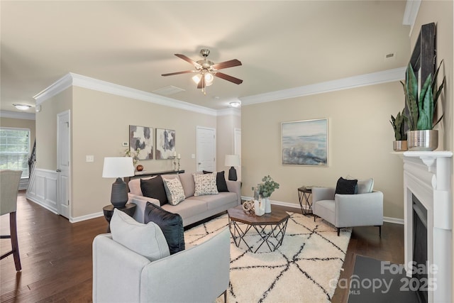 10806 Cove Point Dr, Charlotte, NC 28278 - living area featuring ornamental molding, a ceiling fan, wood finished floors, and a fireplace