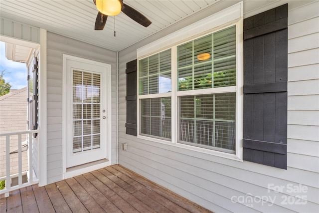 10806 Cove Point Dr, Charlotte, NC 28278 - unfurnished sunroom featuring a ceiling fan