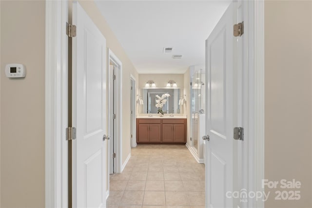 10806 Cove Point Dr, Charlotte, NC 28278 - hall featuring light tile patterned flooring and baseboards